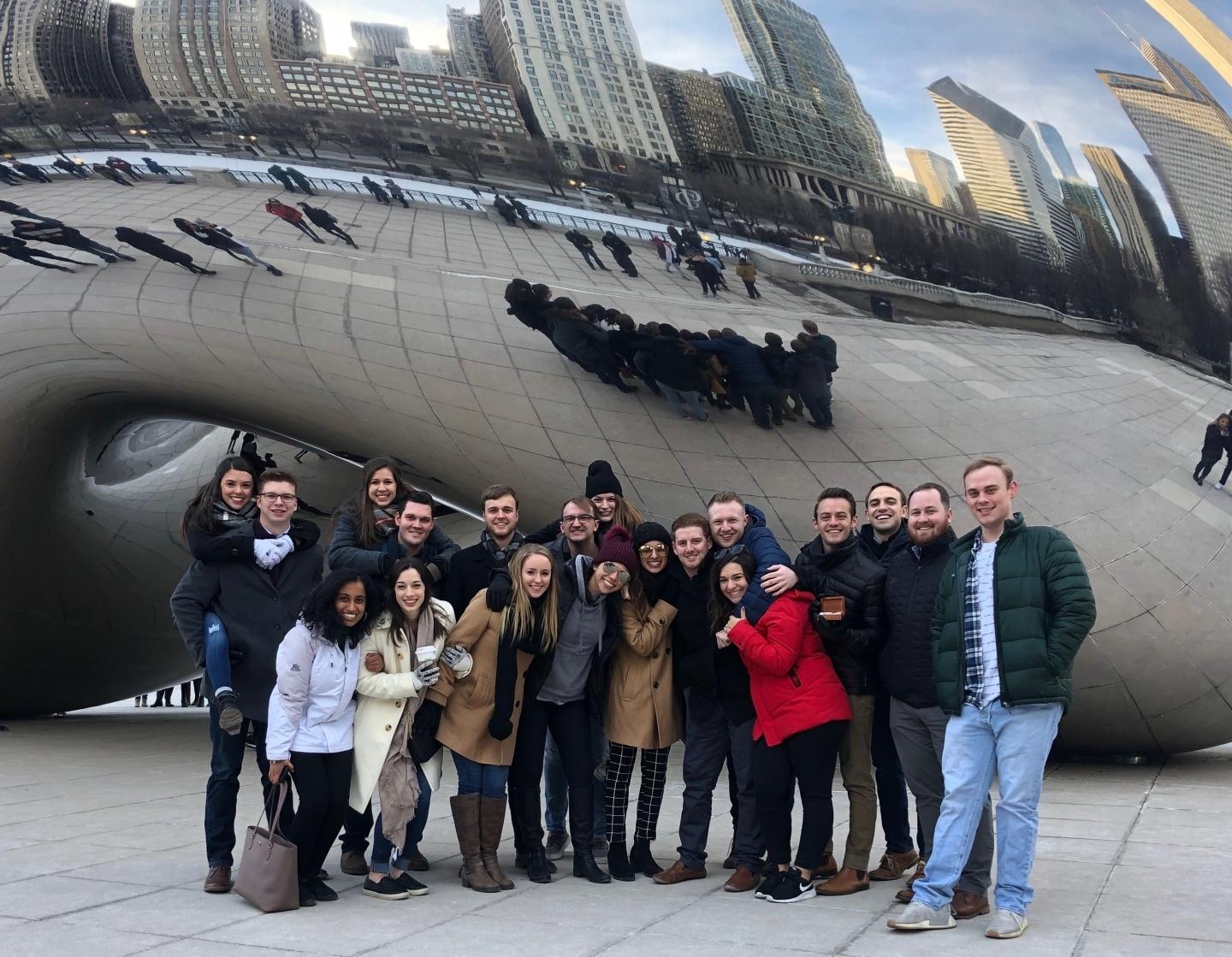 Students pose in front of the Chicago "Bean" while traveling for the ACHE Congress