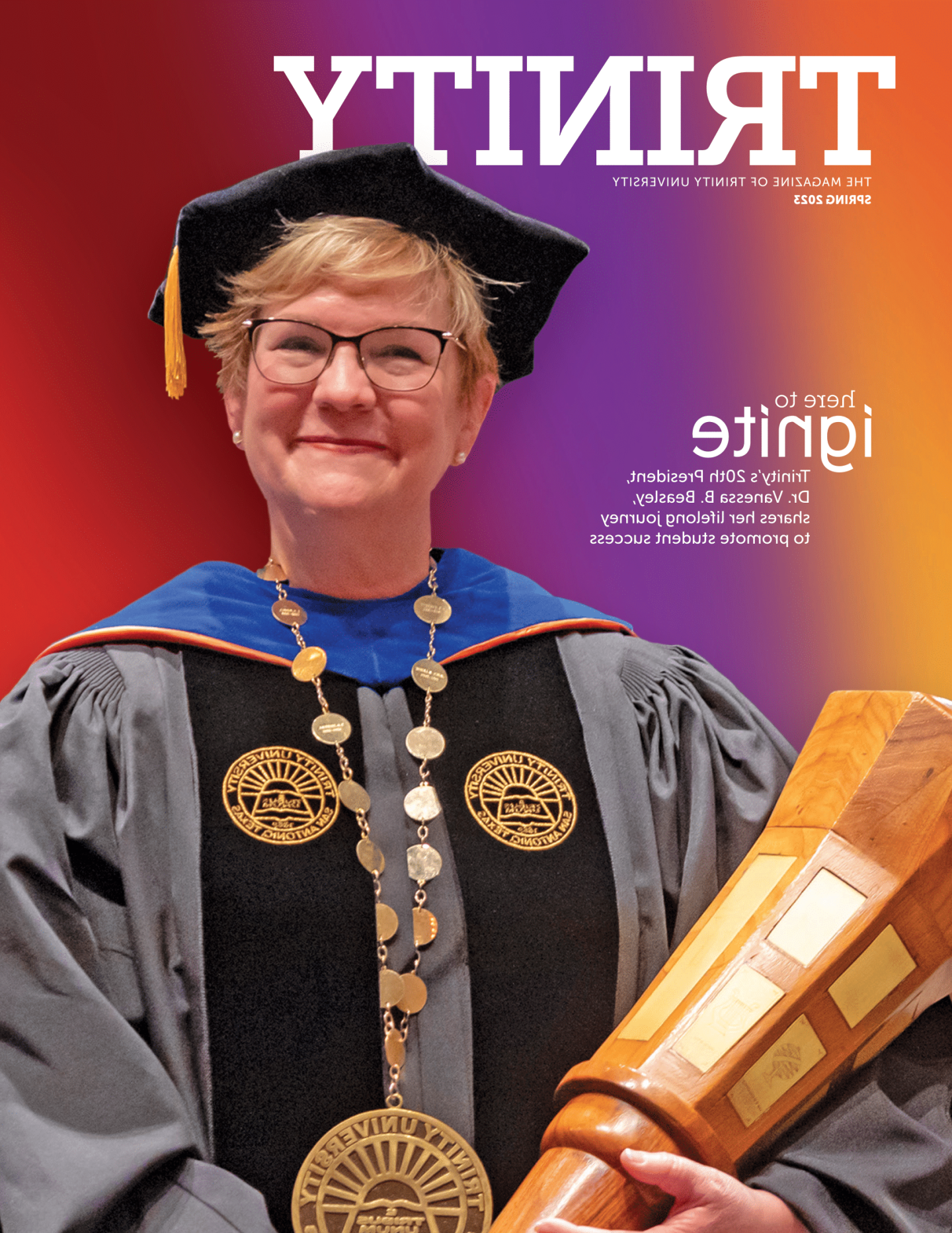 the cover of 赌博娱乐平台网址大全 magazine 2023年春季; A portrait of Vanessa Beasley holding the presidential mace in full regalia in front of a colorful gradient